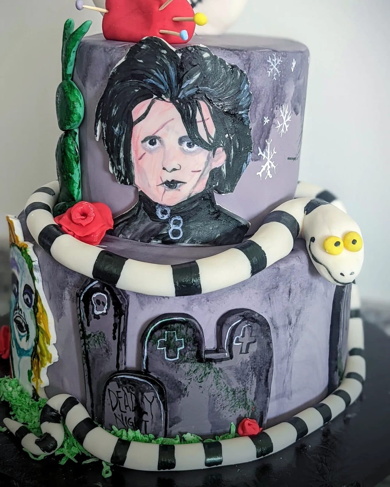 Another view of the black-and-white Tim Burton birthday cake.